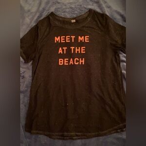 Black t shirt with pink writing